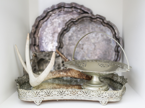 woman in house on stairs with dog